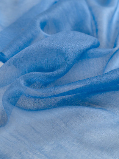Close-up of blue fabric with a soft texture