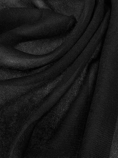 A close-up of the Ovcio Featherlight Black Cashmere Scarf.
