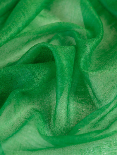 Close-up of green fabric with a soft texture