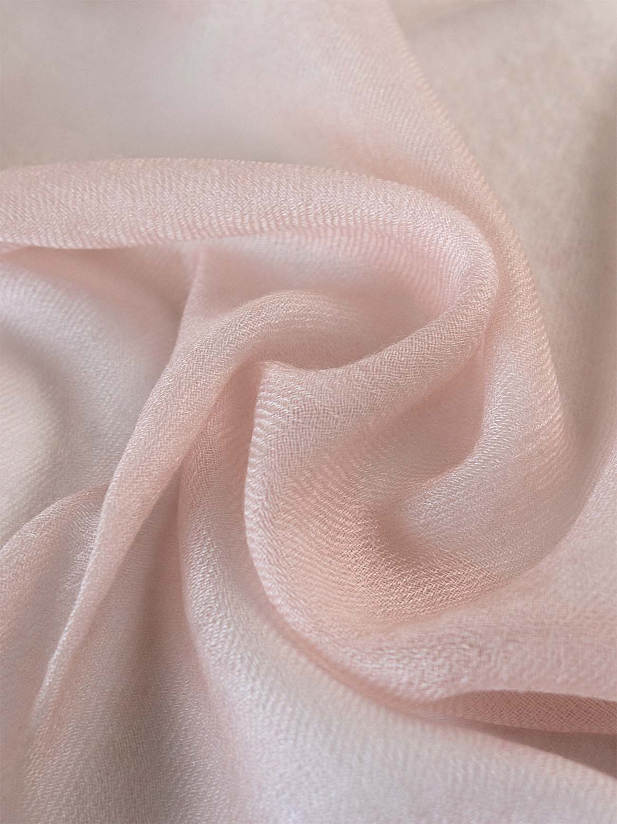 a close-up of the featherlight blush cashmere scarf.